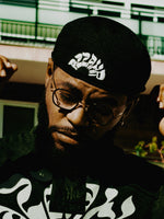 Puff Embroidered Flat Cap [Black]